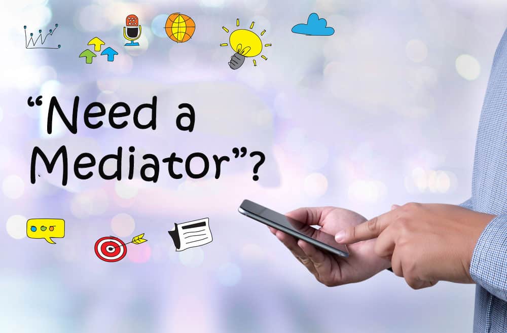 Consider Indiana Divorce Mediation instead of litigation image shows hands holding phone